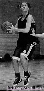 Image of Arizona girls basketball player Brittney Strumer, Voronado High School (Scottsdale), looking to shoot the ball, knees bent. From the Scottsdale Republic, Phoenix, Arizona, January 13, 2006. Photo by Yoko Furukawa